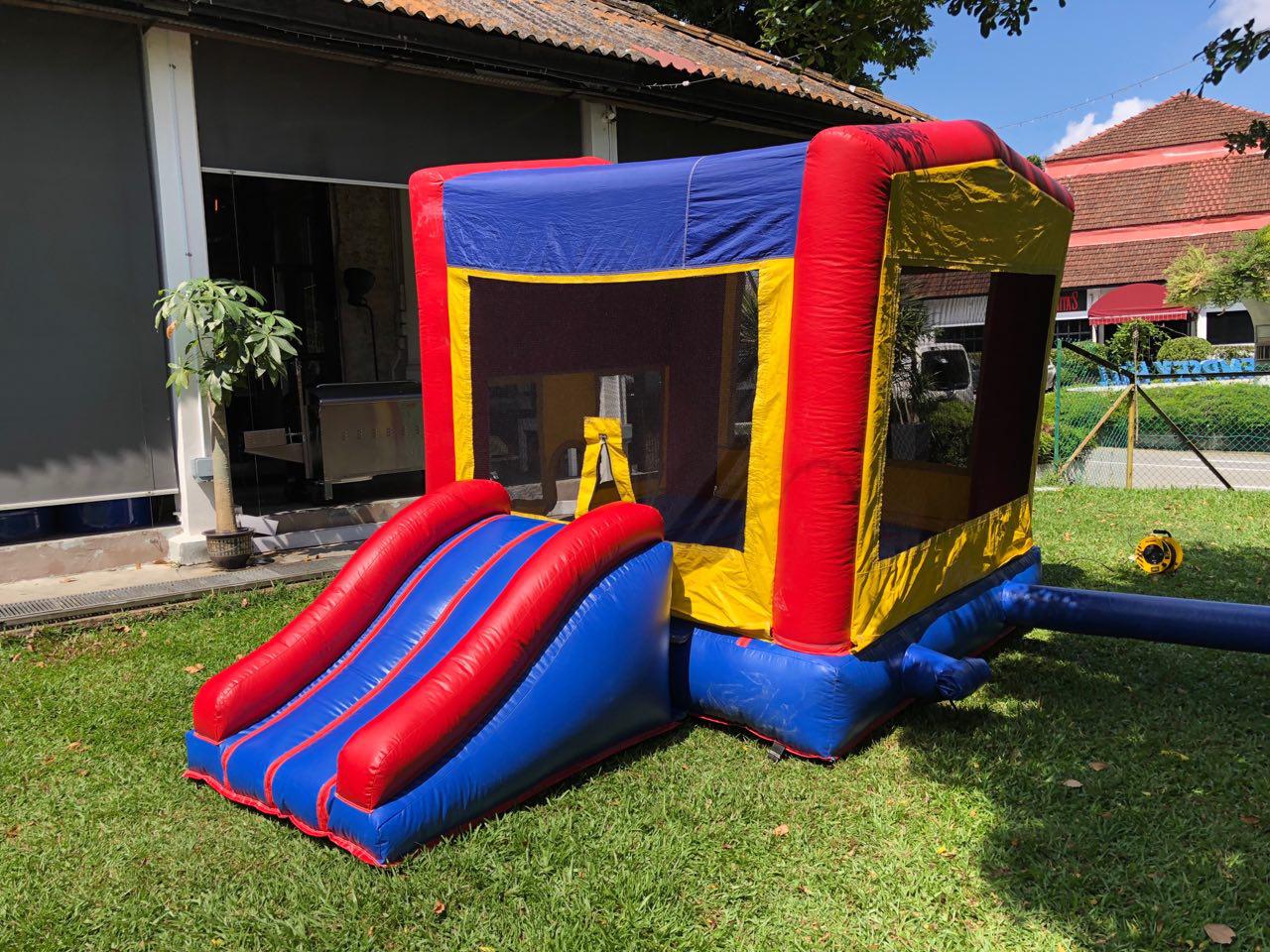Classic bounce house with slide by BounceParkSG