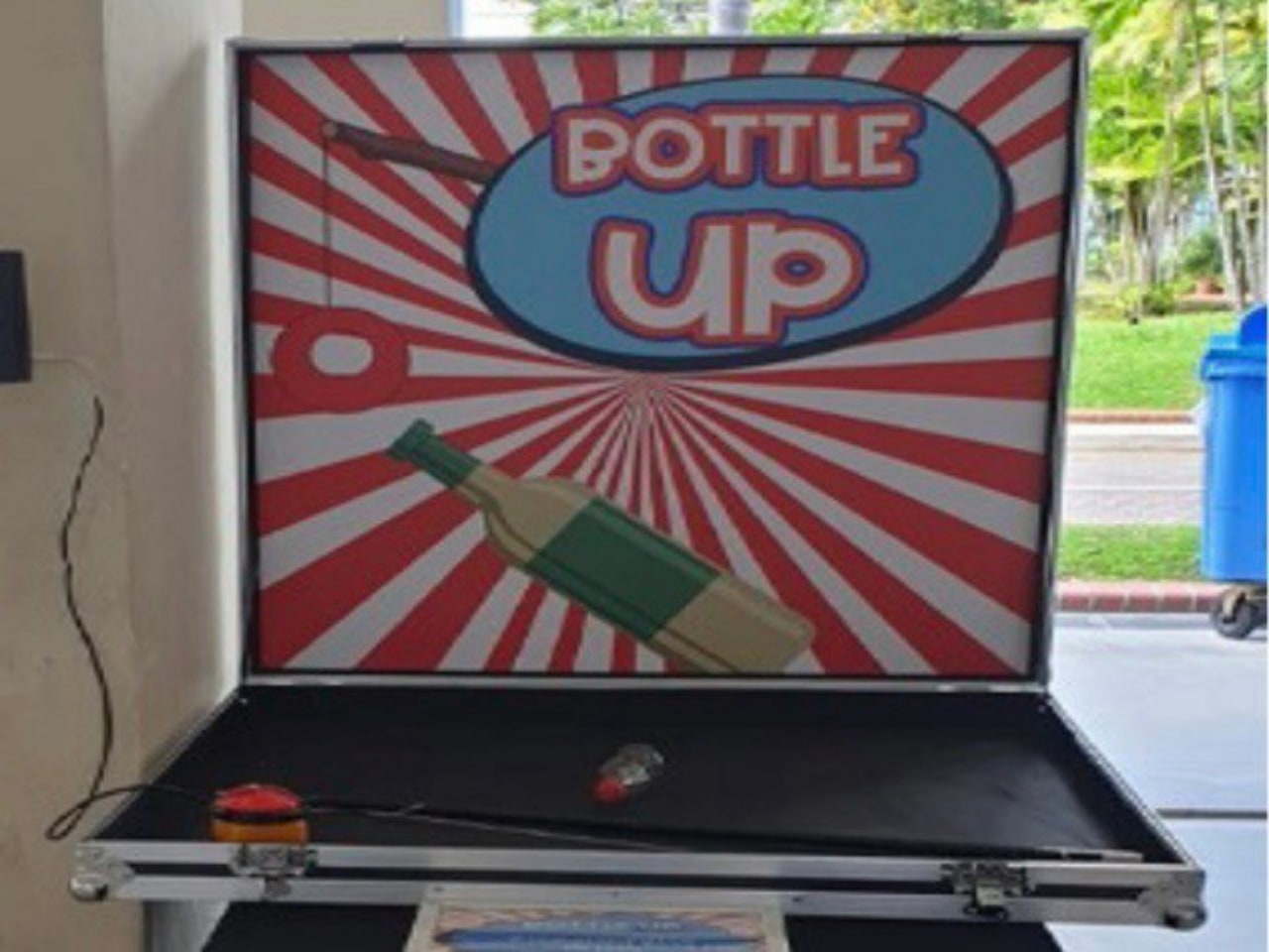 Hook a Bottle carnival game by BounceParkSG