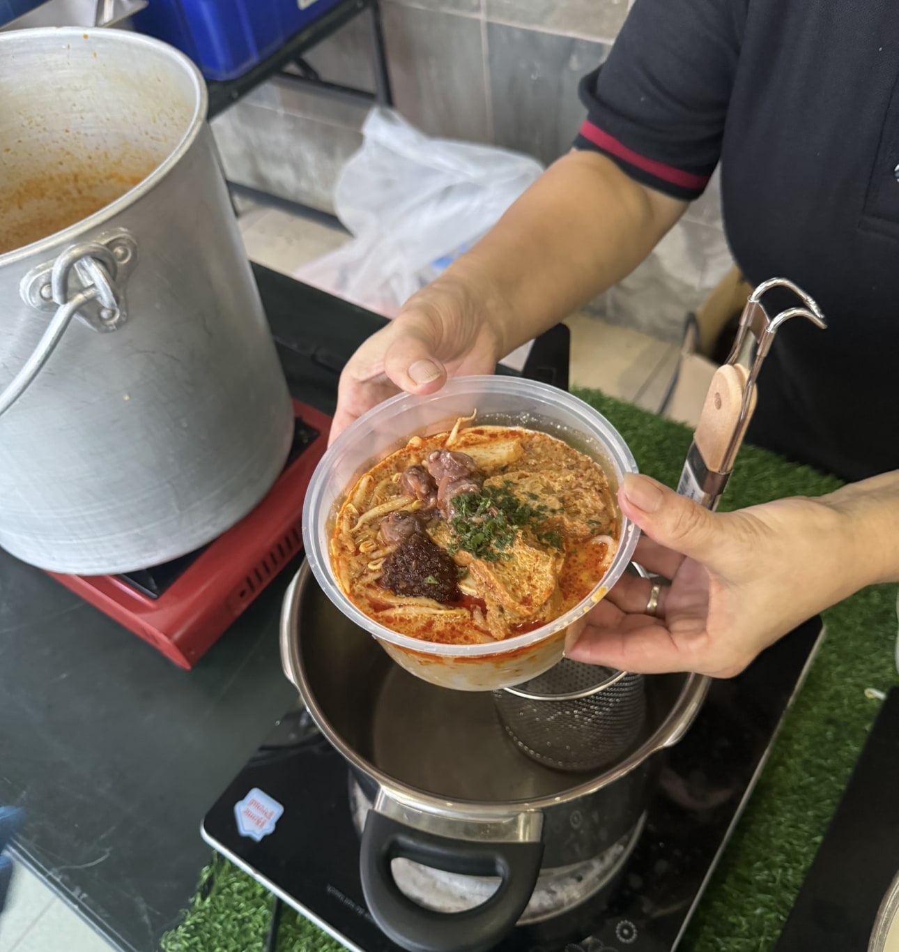 Laksa live station at a BounceParkSG event