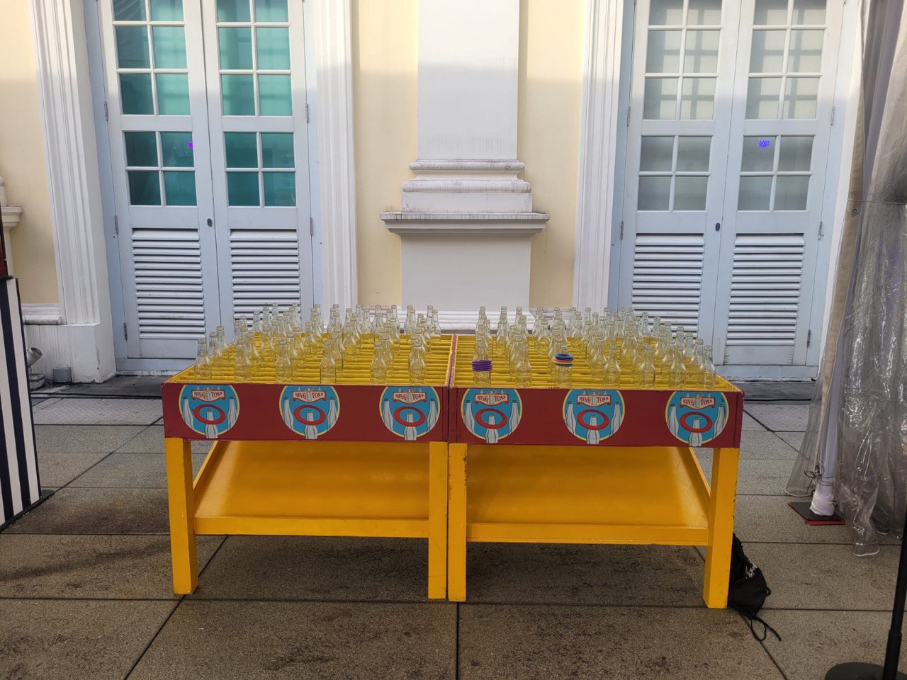 Large bottle ring toss game by BounceParkSG