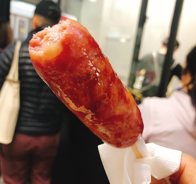 Taiwan sausage on a stick at a BounceParkSG event